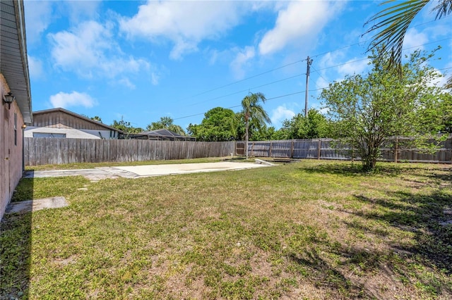 12704 128th Ln, Largo, FL 33774 - view of yard featuring a fenced backyard and a patio area