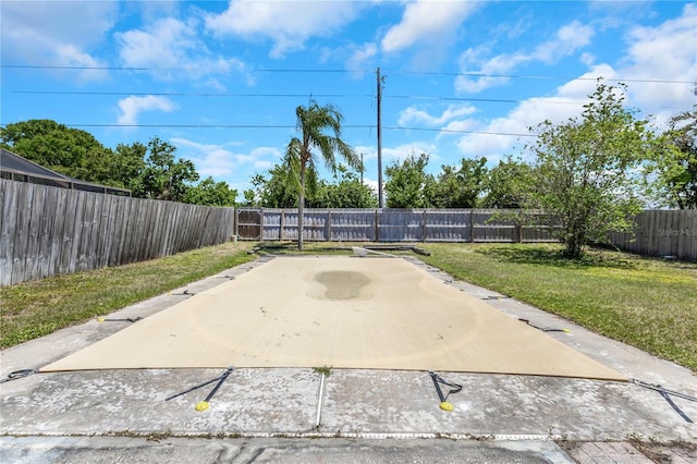 12704 128th Ln, Largo, FL 33774 - view of patio / terrace featuring a fenced backyard