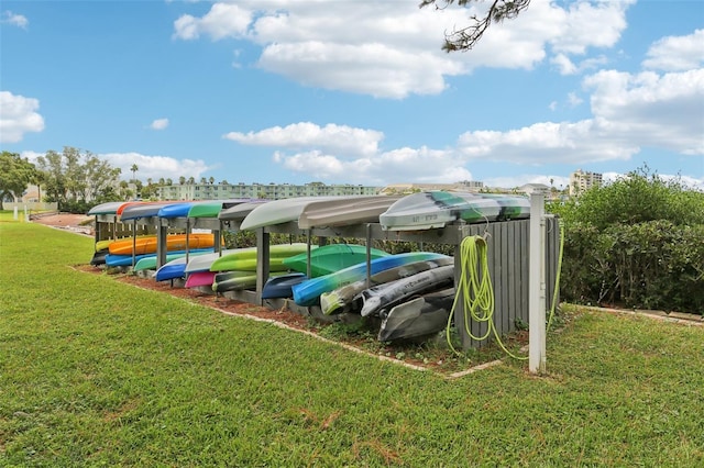 view of community featuring a yard