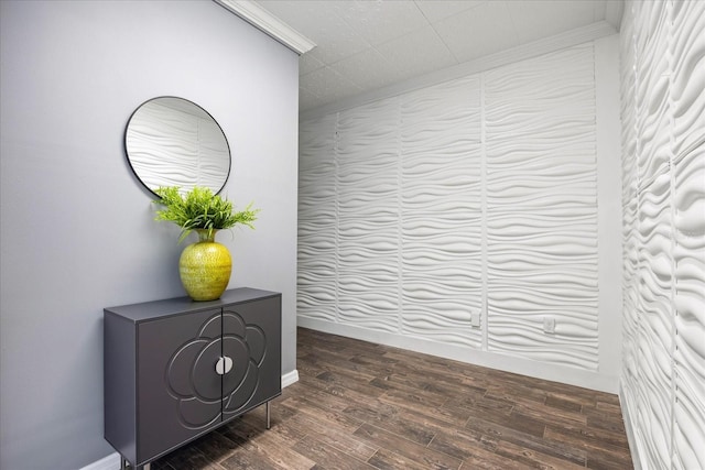 room details featuring ornamental molding and wood finished floors