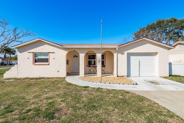 ranch-style house with stucco siding, covered porch, concrete driveway, a garage, and a front lawn