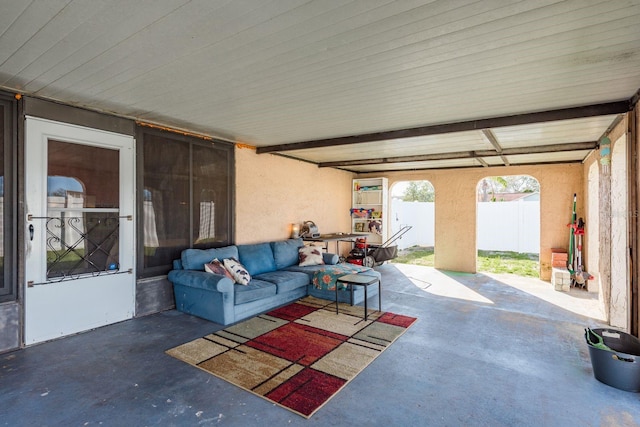 view of patio featuring fence and an outdoor living space