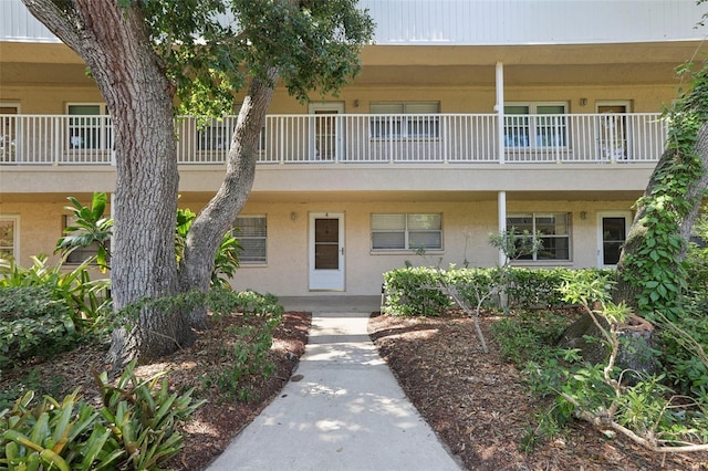 exterior space with stucco siding