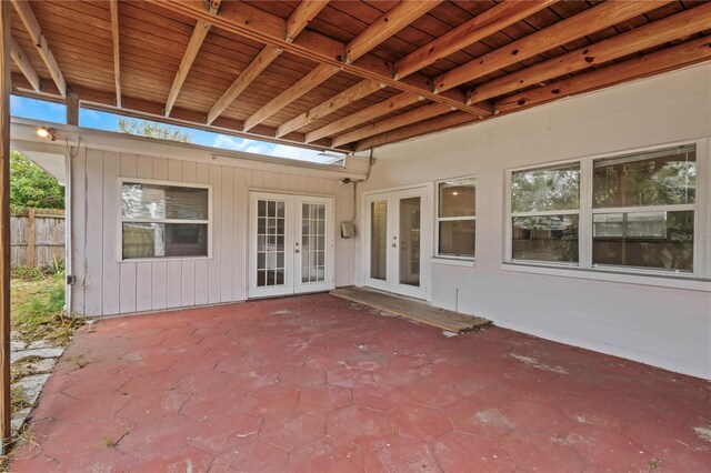 5813 18th Ave S, Gulfport, FL 33707 - view of patio with french doors and fence