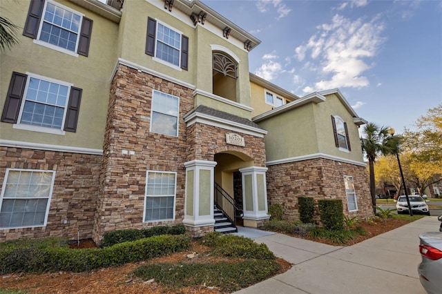 exterior space featuring stucco siding