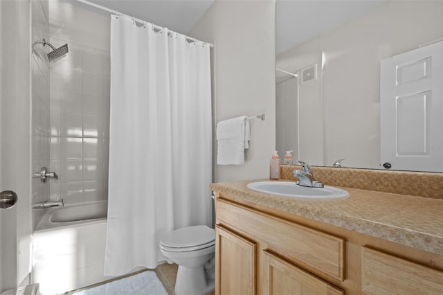 bathroom with visible vents, shower / tub combo, vanity, and toilet