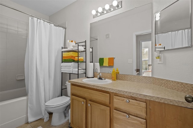 full bath featuring toilet, tile patterned flooring, shower / tub combo with curtain, and vanity