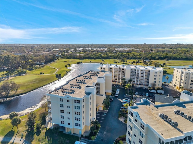 drone / aerial view featuring a water view and golf course view