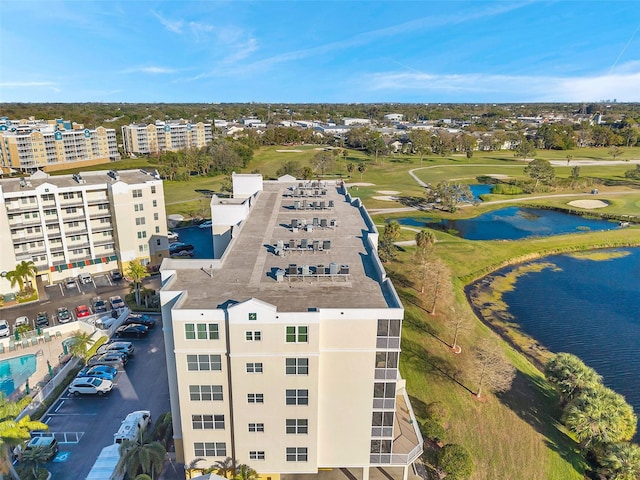 aerial view featuring a water view and golf course view