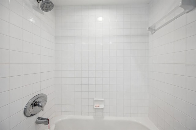 bathroom with shower / tub combination