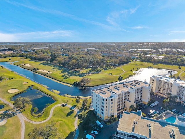 aerial view with view of golf course and a water view