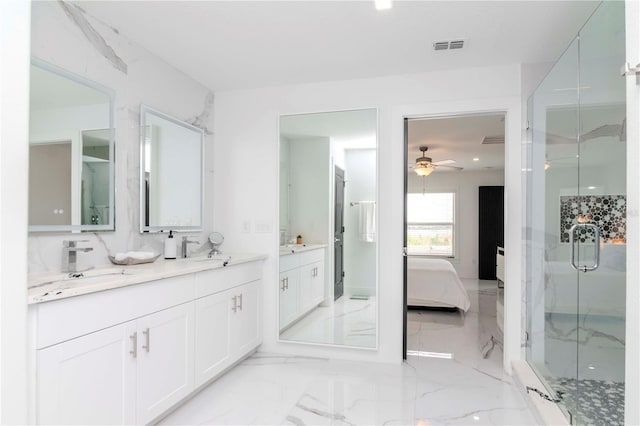 ensuite bathroom featuring ensuite bathroom, visible vents, vanity, marble finish floor, and a marble finish shower