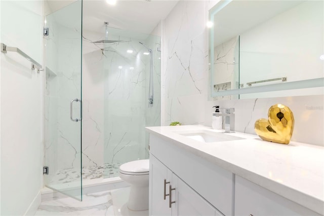 full bathroom with toilet, marble finish floor, a marble finish shower, and vanity