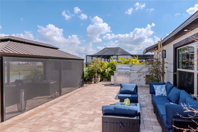 view of patio / terrace with an outdoor hangout area and area for grilling