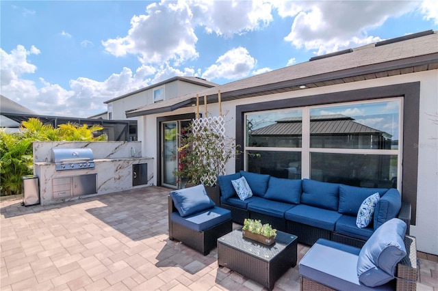 view of patio featuring area for grilling, grilling area, and an outdoor living space