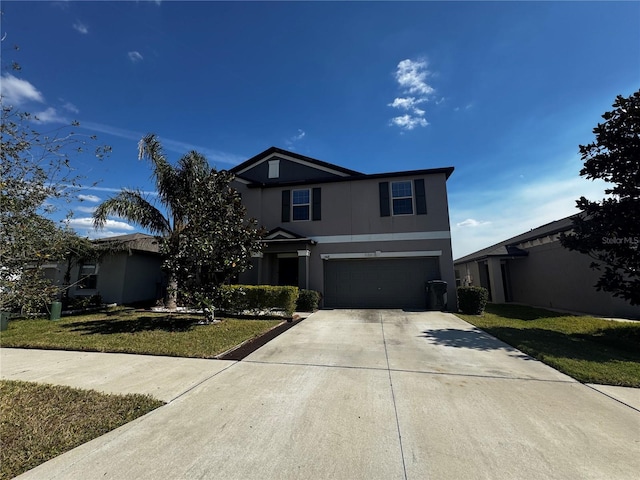 traditional-style house with driveway, stucco siding, an attached garage, and a front yard