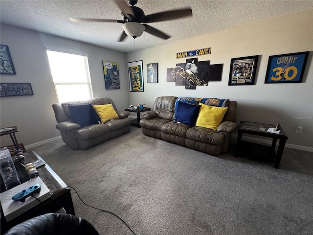 living area with baseboards, a textured ceiling, a ceiling fan, and carpet flooring