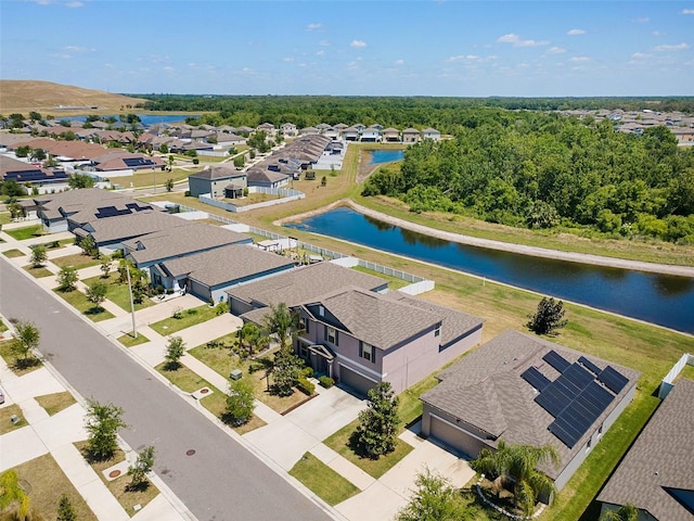 aerial view featuring a residential view and a water view