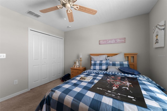 14618 Scottburgh Glen Dr, Wimauma, FL 33598 - carpeted bedroom with a closet, a ceiling fan, and baseboards