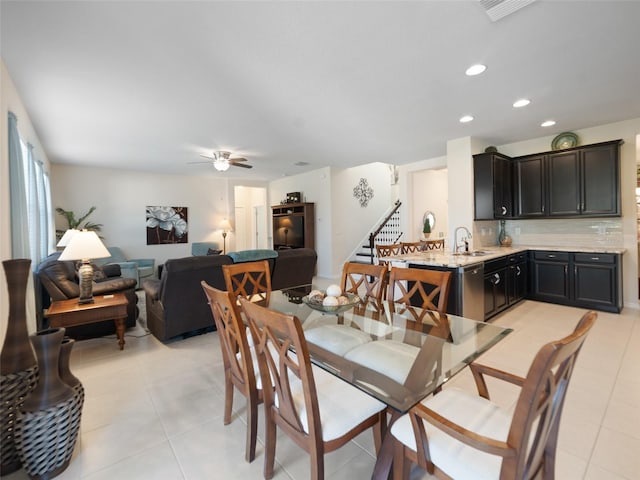 dining area featuring light tile patterned floors, ceiling fan, recessed lighting, visible vents, and stairway