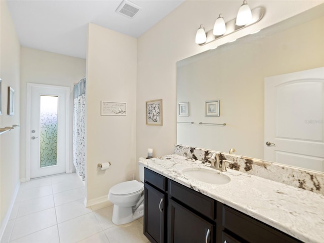 full bathroom featuring visible vents, baseboards, toilet, tile patterned flooring, and vanity