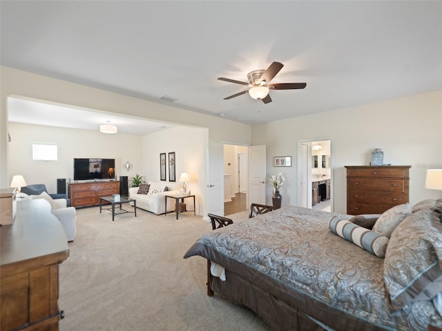 bedroom with carpet floors, ceiling fan, and visible vents