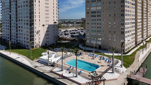 view of pool with a water view