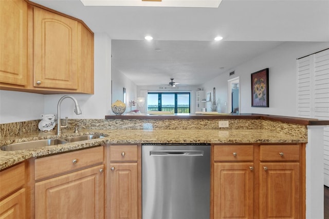 kitchen with ceiling fan, recessed lighting, a sink, stainless steel dishwasher, and light stone countertops