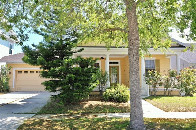 view of front facade featuring driveway and an attached garage