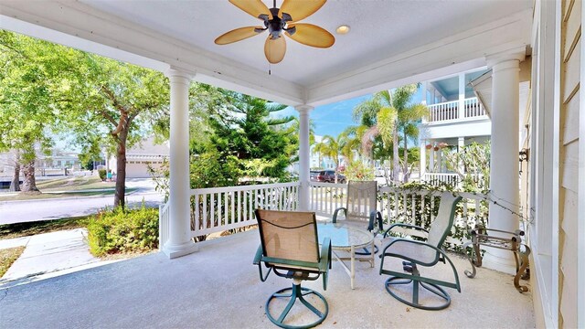 view of patio / terrace featuring a ceiling fan and outdoor dining area