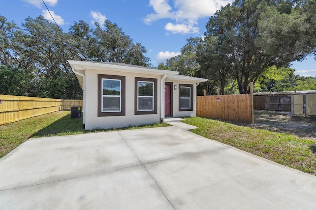 view of outbuilding with fence