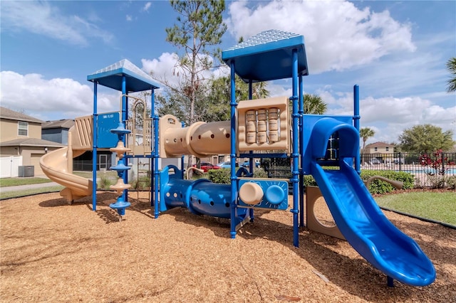 community jungle gym featuring fence