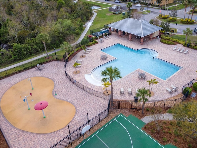 pool featuring a patio and fence