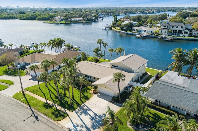 bird's eye view featuring a water view and a residential view