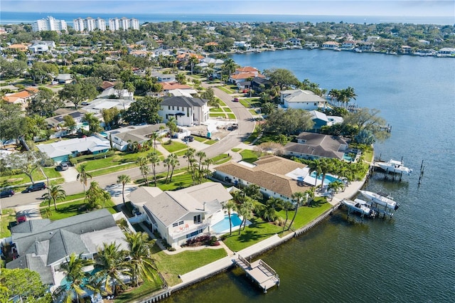 aerial view with a water view and a residential view