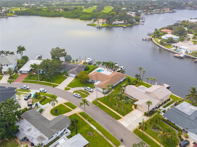 bird's eye view with a water view and a residential view