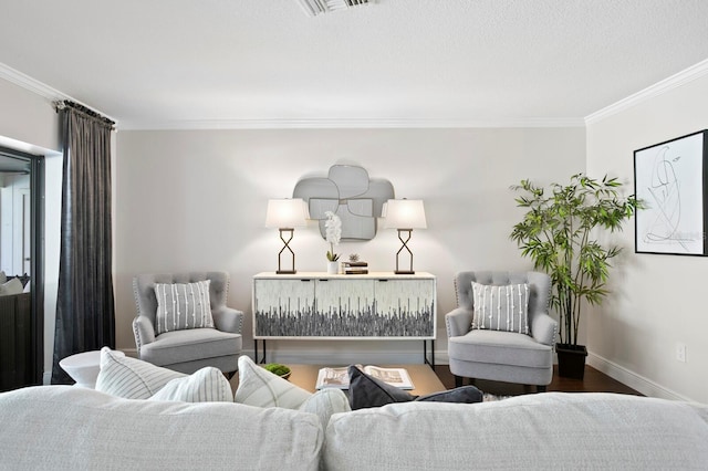 living room with baseboards, wood finished floors, and ornamental molding