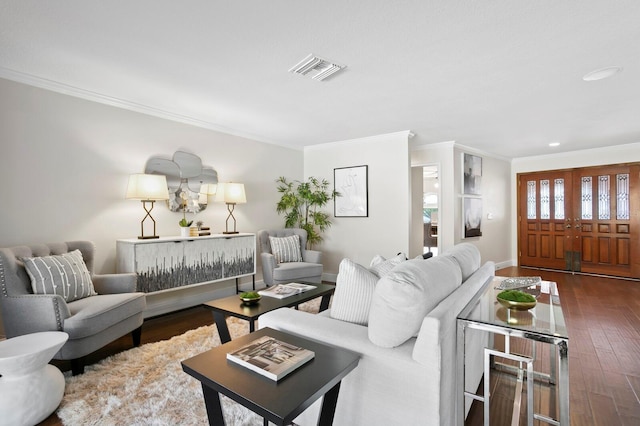 living room featuring recessed lighting, visible vents, crown molding, and wood finished floors