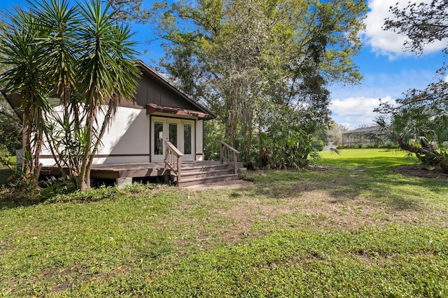 view of yard with a wooden deck