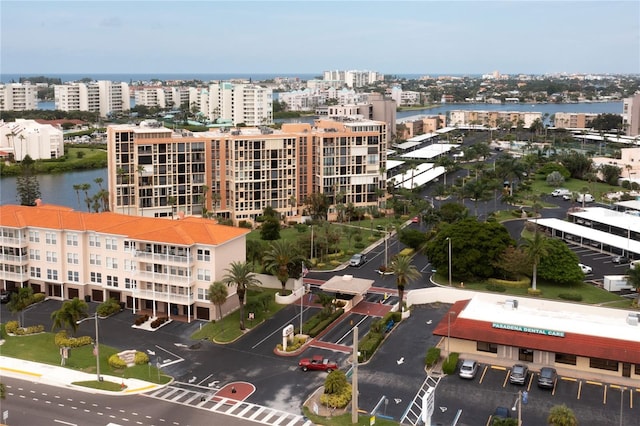 bird's eye view featuring a water view and a view of city