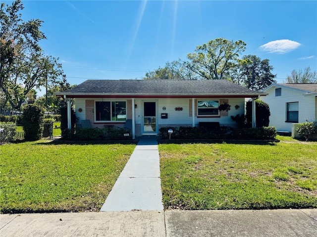 bungalow-style home with a porch and a front yard