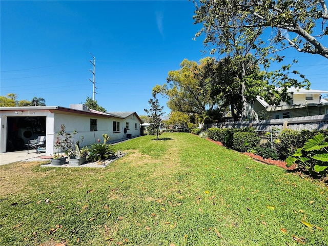 view of yard with fence