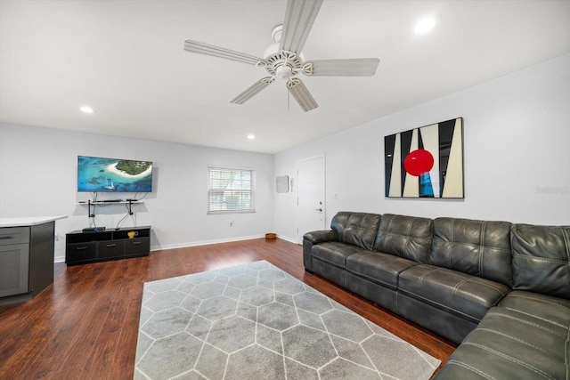 living room with ceiling fan, recessed lighting, wood finished floors, and baseboards