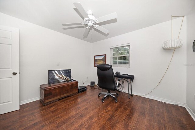 office space featuring ceiling fan, wood finished floors, and baseboards