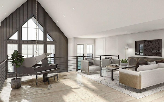 sitting room featuring high vaulted ceiling and hardwood / wood-style floors