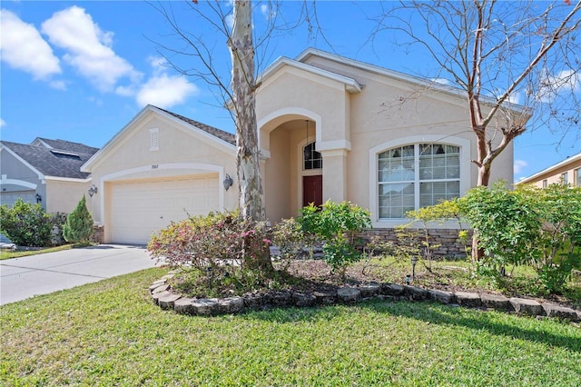 view of front facade featuring a garage, a front lawn, concrete driveway, and stucco siding