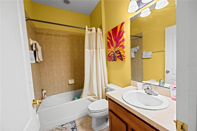 bathroom featuring toilet, tile patterned flooring, shower / tub combo with curtain, and vanity