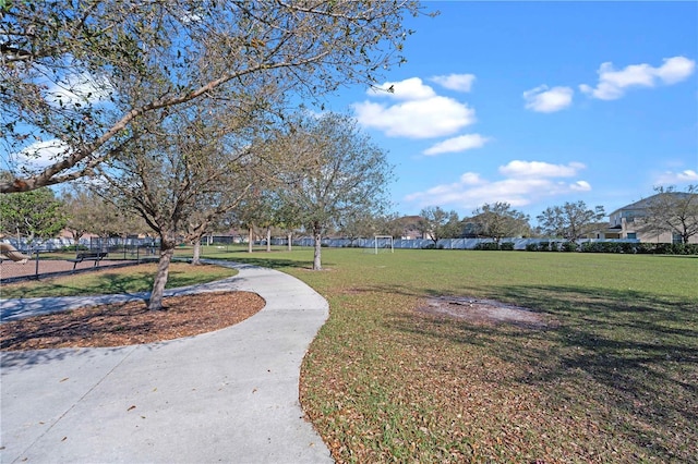 view of home's community featuring a yard