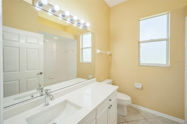 full bath with baseboards, toilet, tile patterned flooring, walk in shower, and vanity