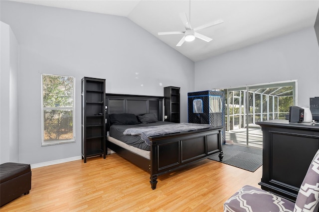 bedroom with ceiling fan, high vaulted ceiling, light wood-style floors, and access to exterior